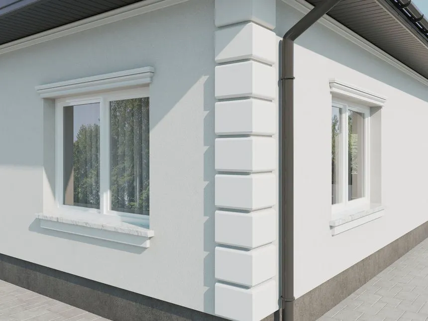 Nowoczesna elewacja budynku z tynkiem architektonicznym i detalami w formie boni